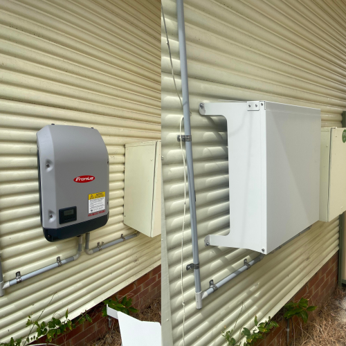 Fronius Solar Inverter before and after a solar inverter cover installation